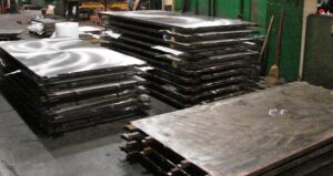 Plywood Press Platens in Ground and Non-Ground State During Blanchard Grinding Press Platens Ground and Non-Ground